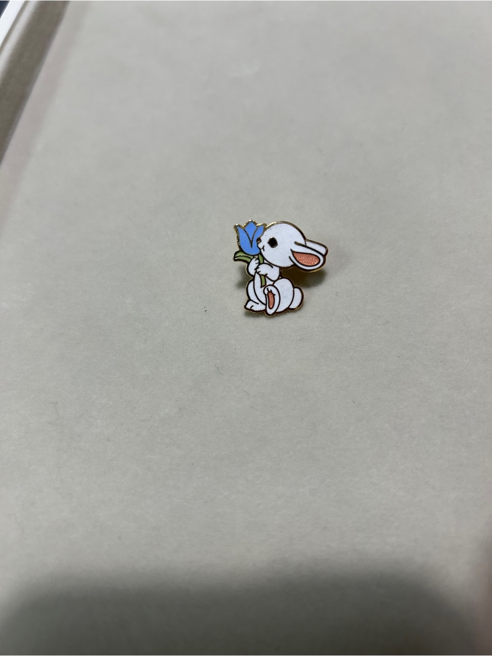 Hallmark White Bunny pin with Blue Flower